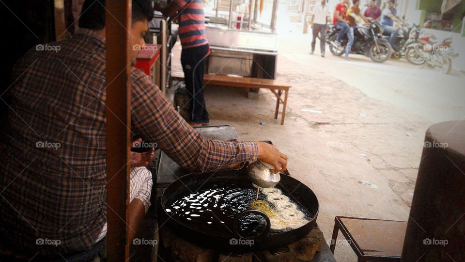 Making of an Indian sweet dish 'Jalebi'