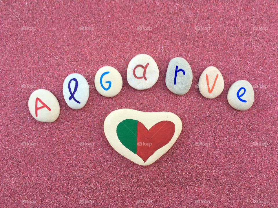 Text on pebble stones