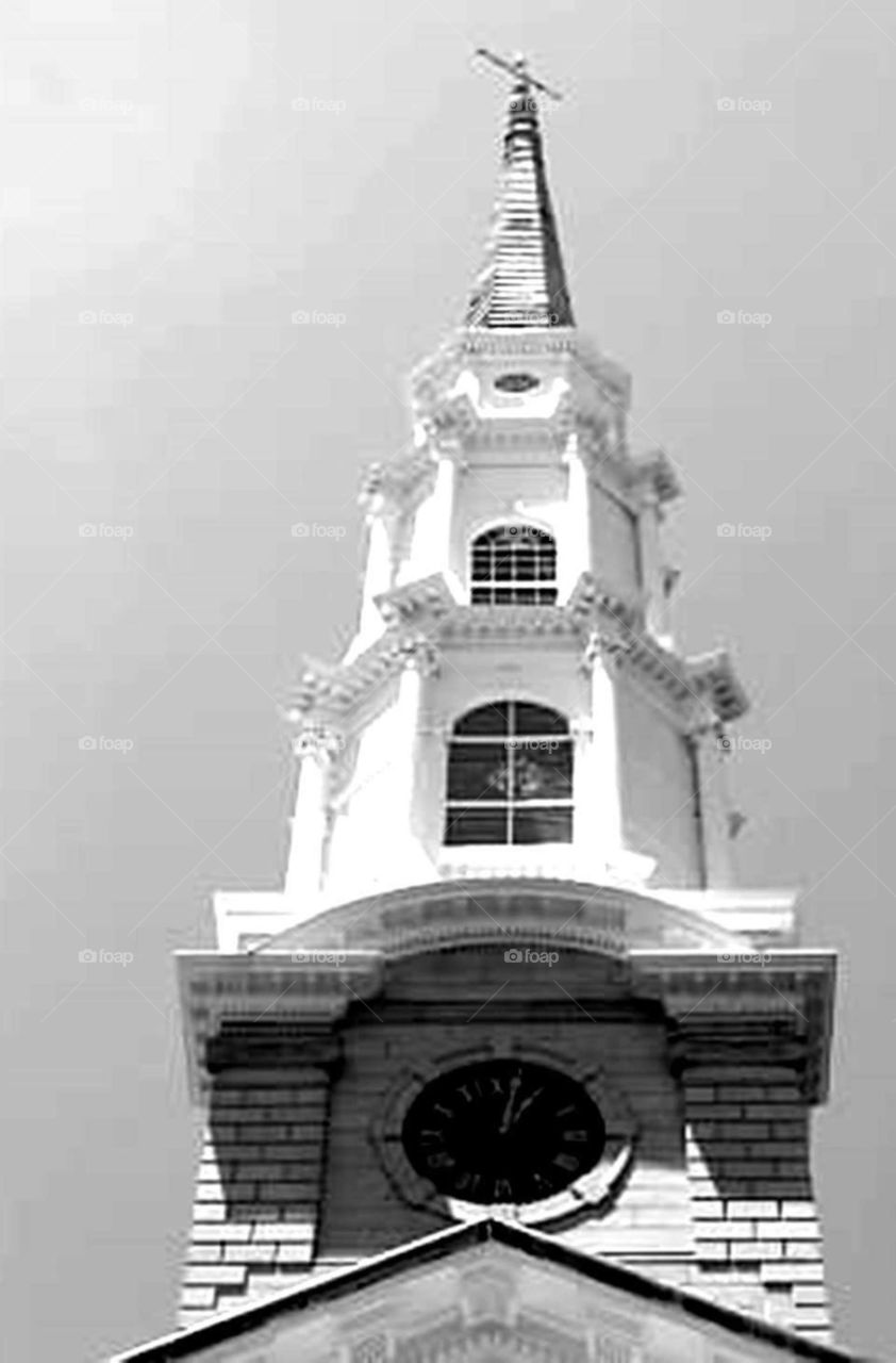 Church. Focusing on the steeple of the church.