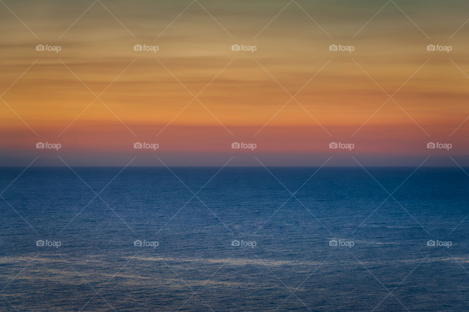 When the sky meet the sea. Beautiful rainbow colored sky after sunset over Mediterranean Sea.