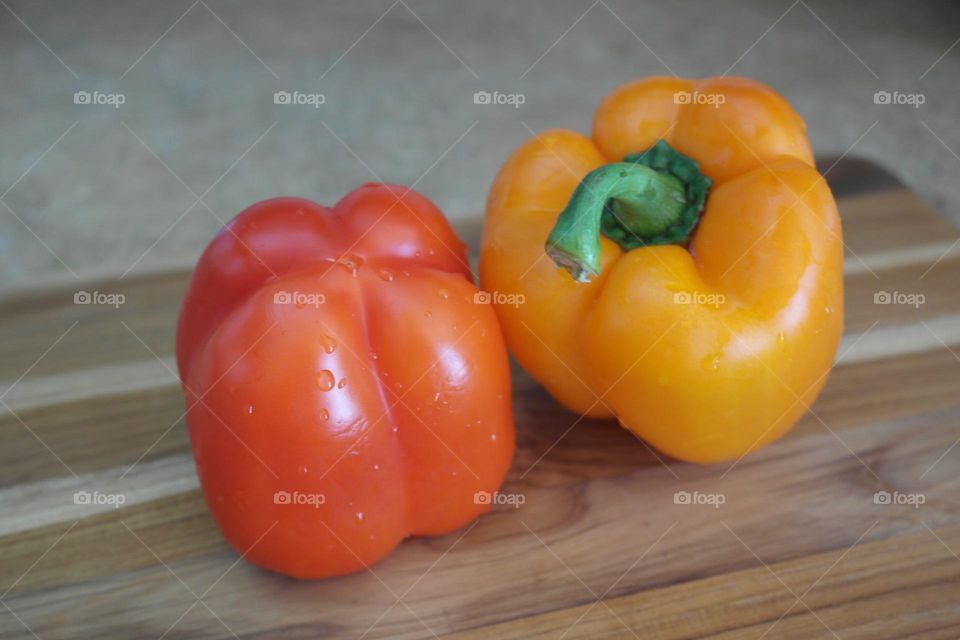 Pepper on a wooden board 