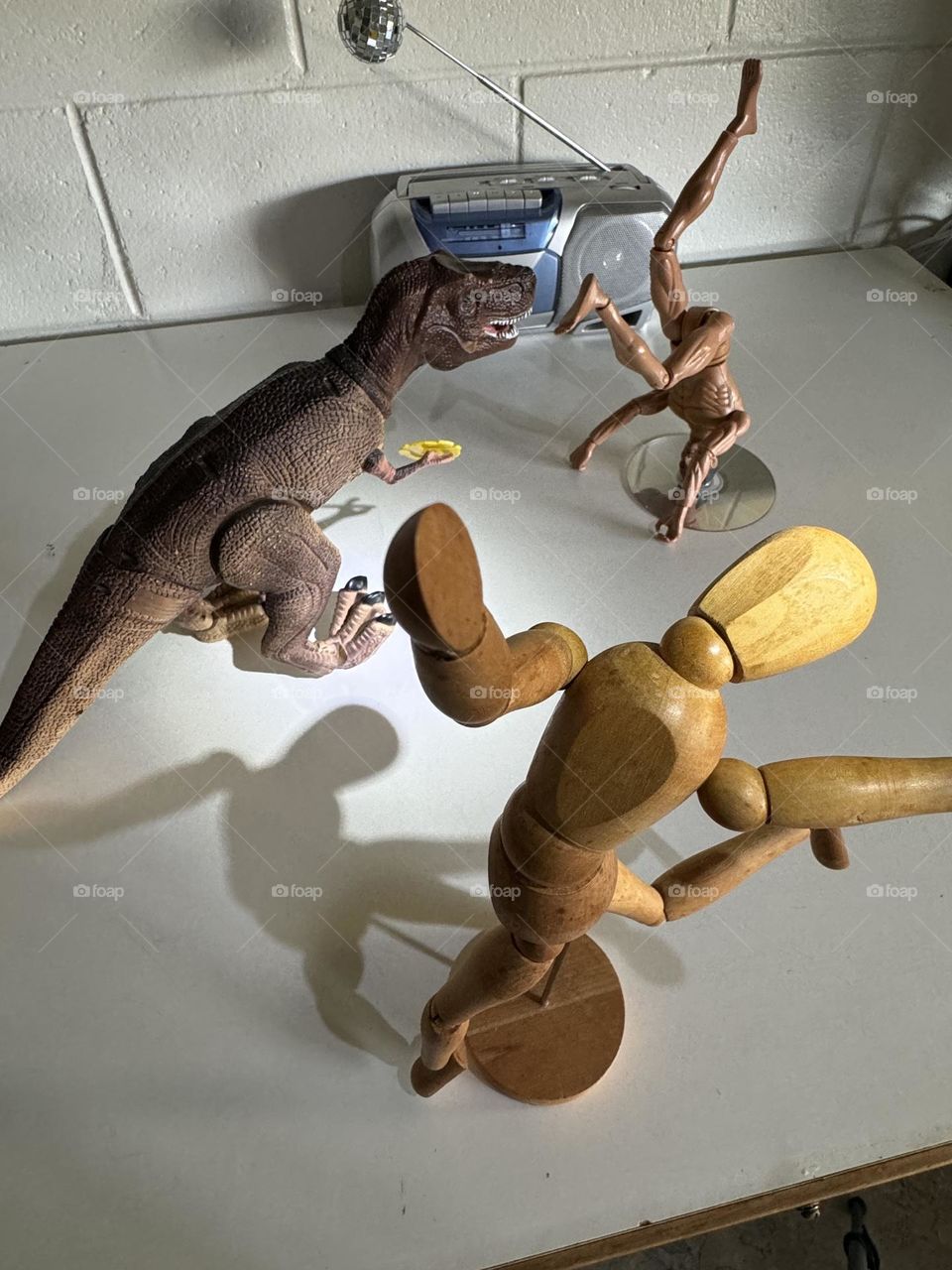 Was everybody Kung Fu Fighting? Boombox disco ball Artist Mannequin T. Rex with 45 RPM spacer and G.I. Joe head spinnin’ on a CD like nobody was watching 