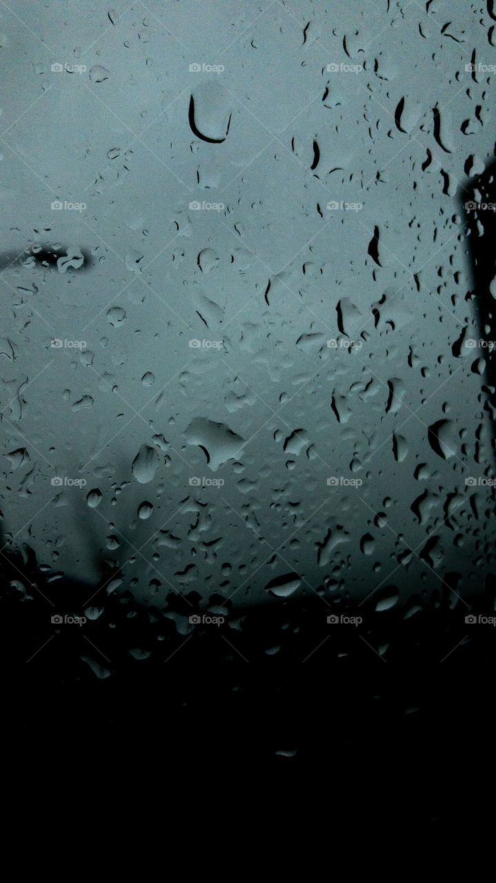 Rain droplets on the car windshield