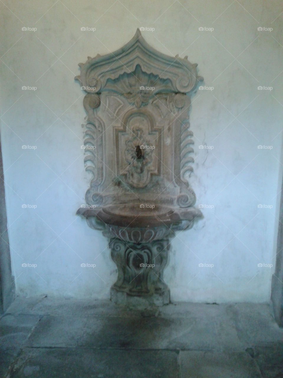 Old Fountain. Old fountain of a portuguese church