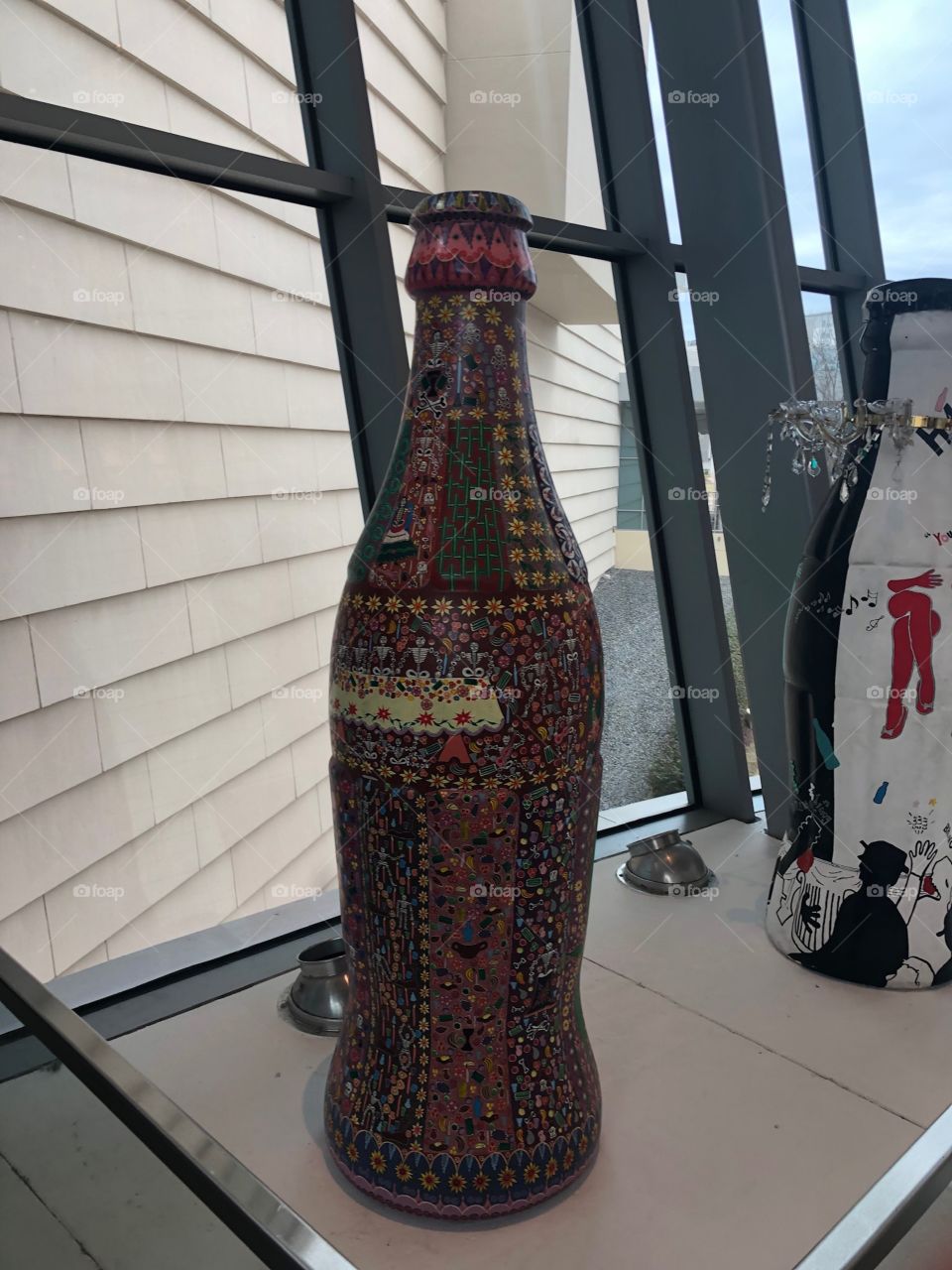 Designed coke bottle
