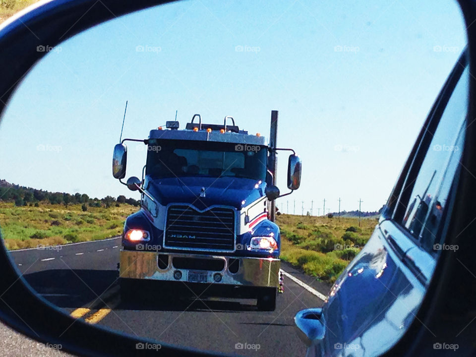 A beautiful truck seen on the rearview mirror during my trip on the american roads 