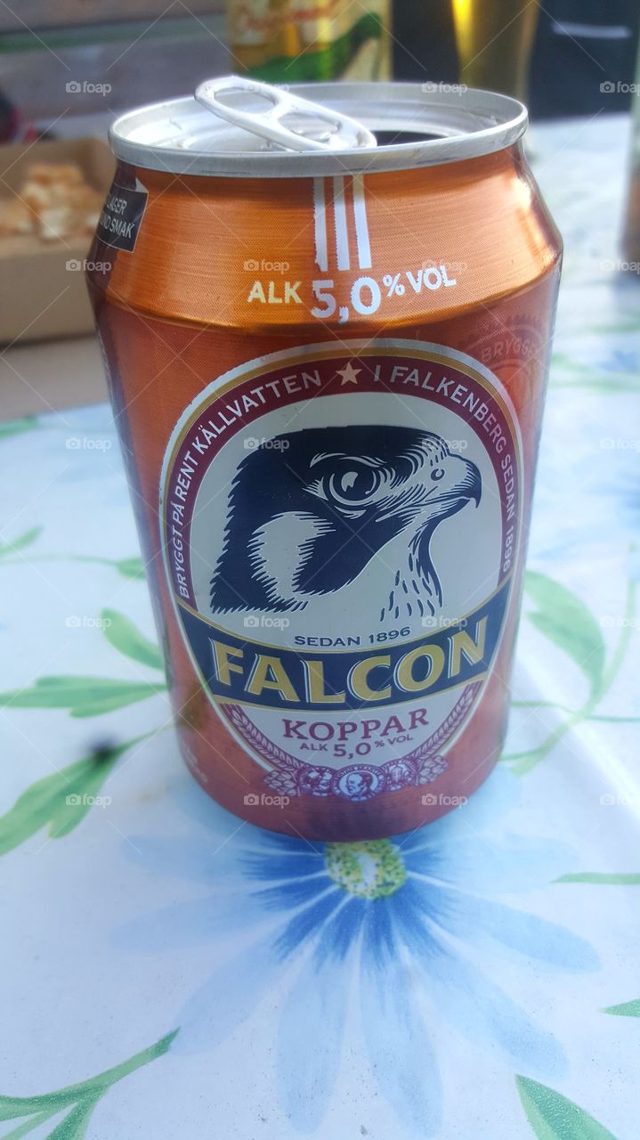 Falcon beer can.