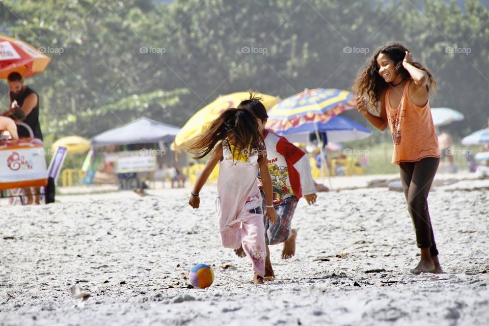 Brazilian indigenous children playing soccer