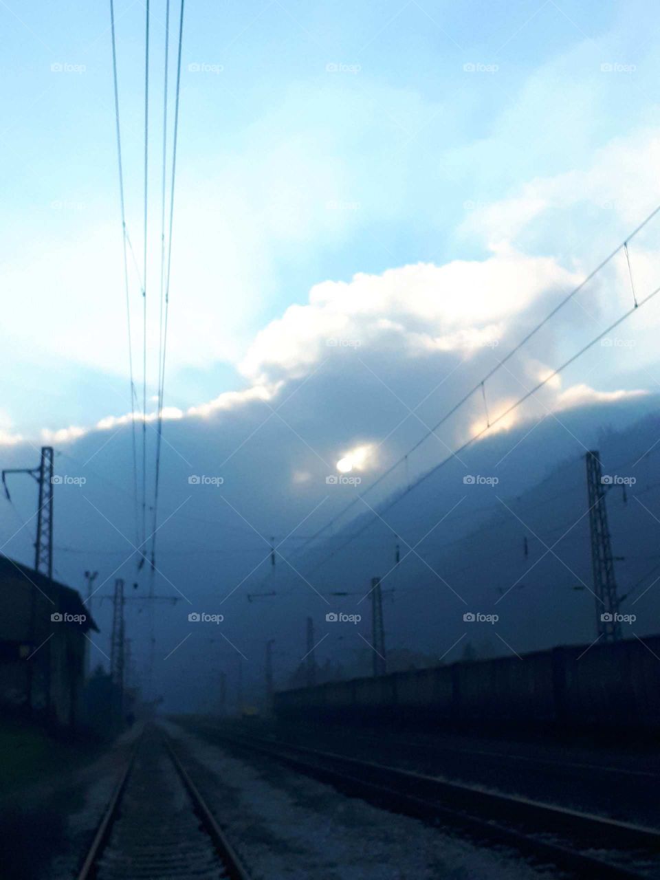 fog on the hill hides the sun and everything looks like an eclipse