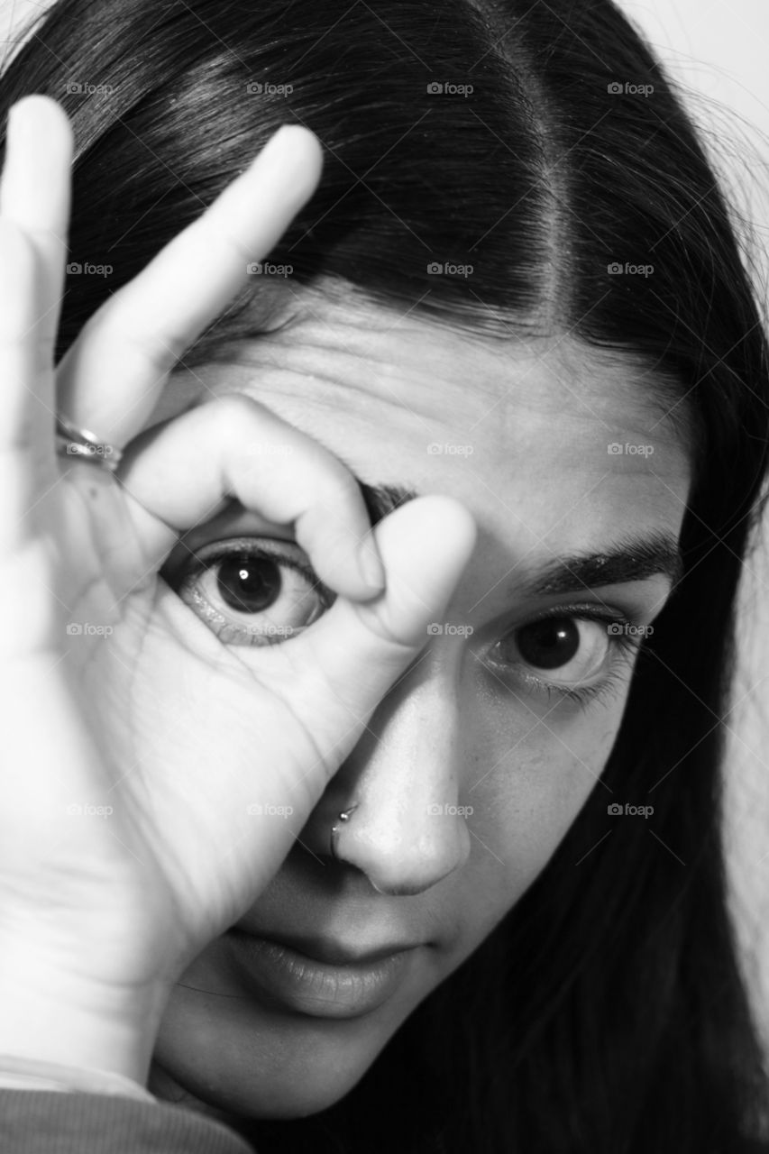 Black-and-white portrait of a teen girl