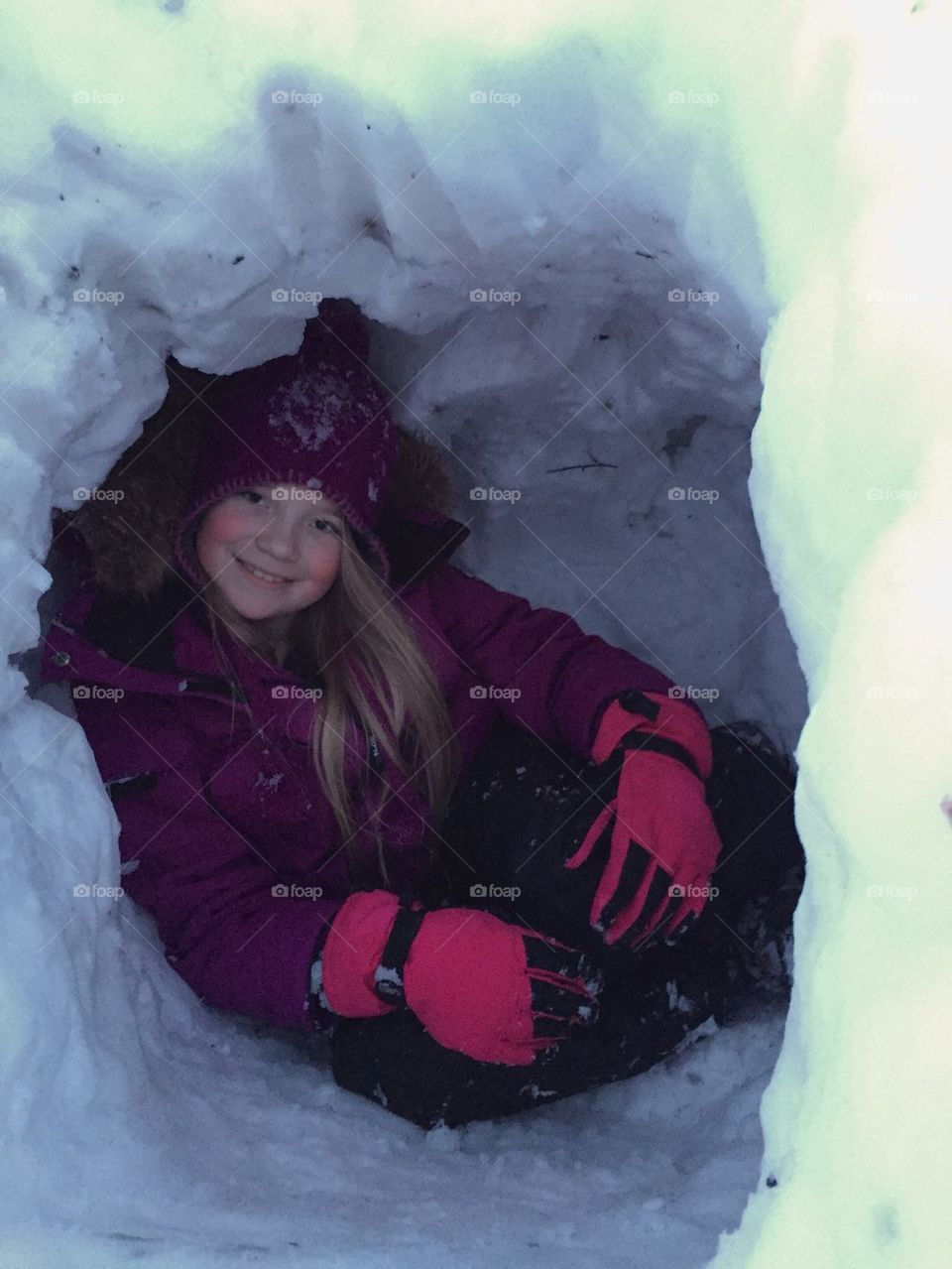 Girl in a snow cave