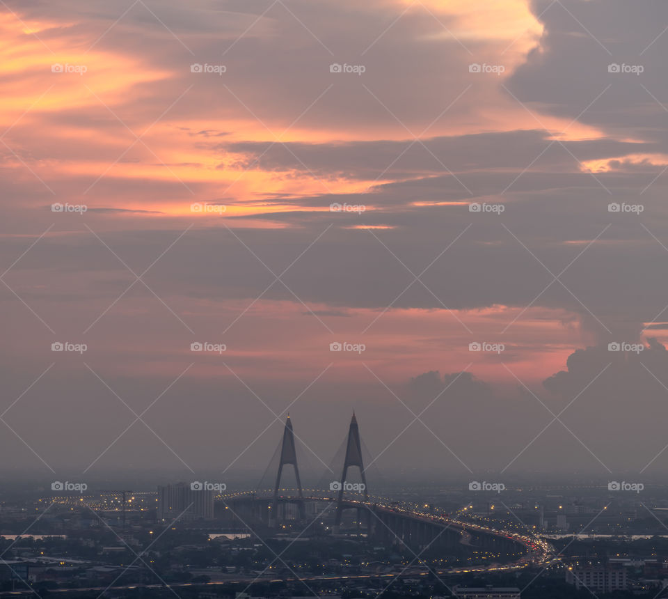Beautiful cloudy over the Bhumibol landmark bridge in twilight moment at Bangkok Thailand