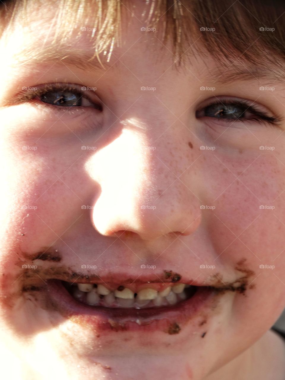 Boy Eating Chocolate
