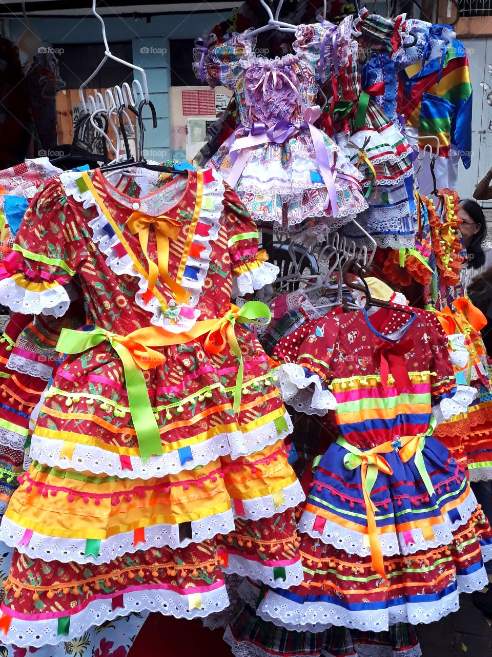 Dresses typical of the June fiestas celebrating the days of St. John and St. Peter.