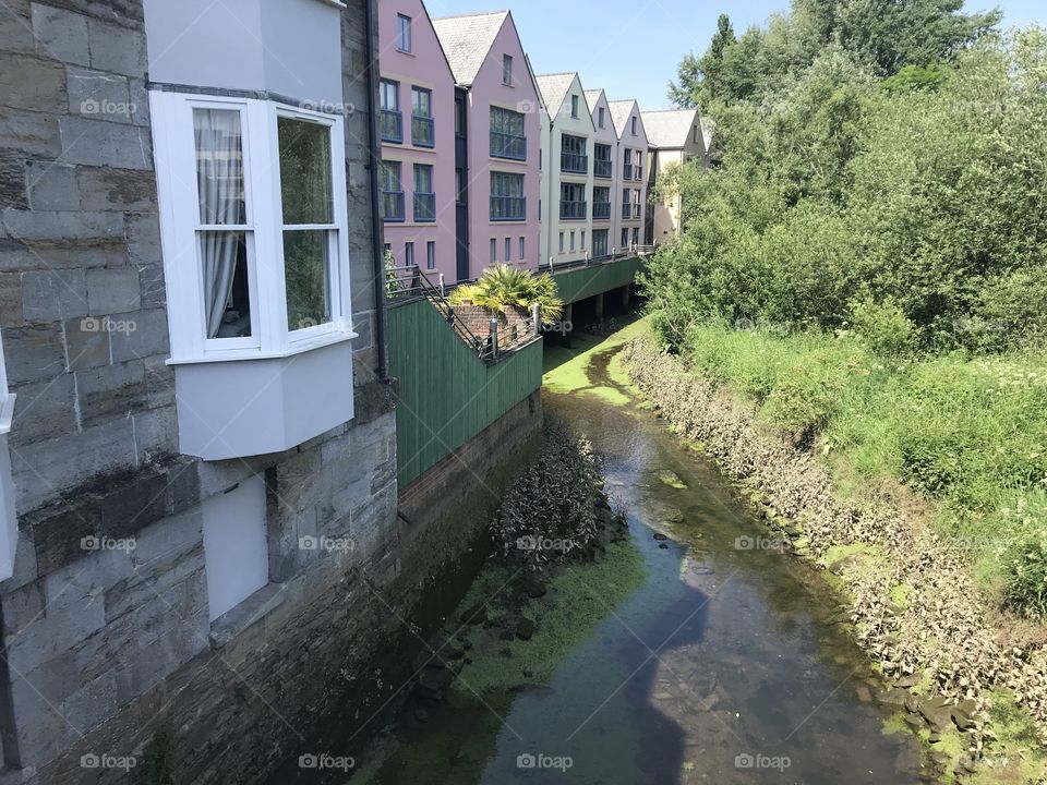 Modern town houses take centre stage along many of Devon’s canals including this attractive one at Totnes.