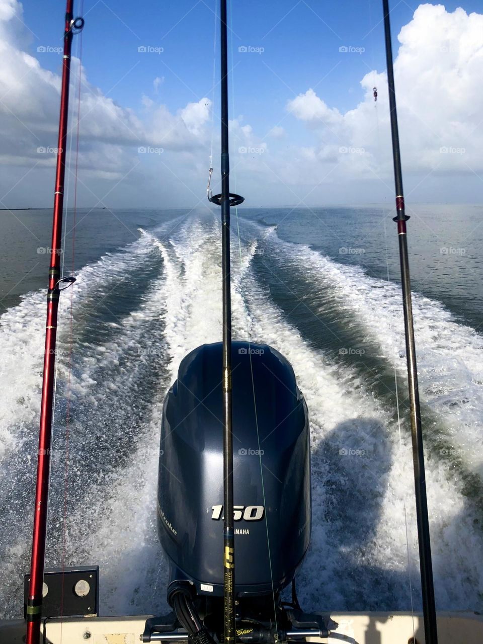 Fishing is how we spend our time during the summer. Three poles ready for the destination!