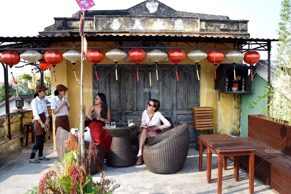 Enjoying a break during our visit day in Hoi An Vietnam 