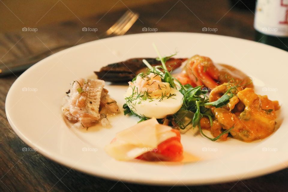 Dish with fish and egg