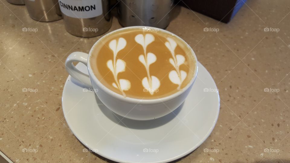 love latte on a coffee shop counter