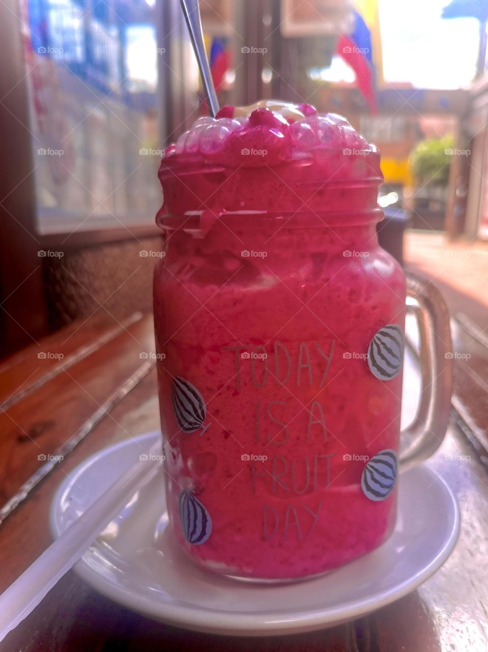 A refreshing juice of blackberries in a hot weather 