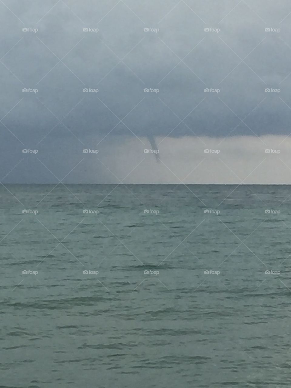 Miami Tornadic Waterspout . The first thing I saw when we stepped on the beach in Miami was this storm brewing in the distance! 