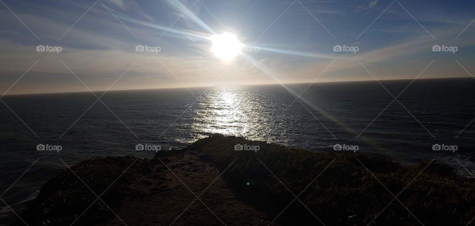 Sunset on Bodega Head Bay. Gorgeous View of ocean. Deep blue sky.