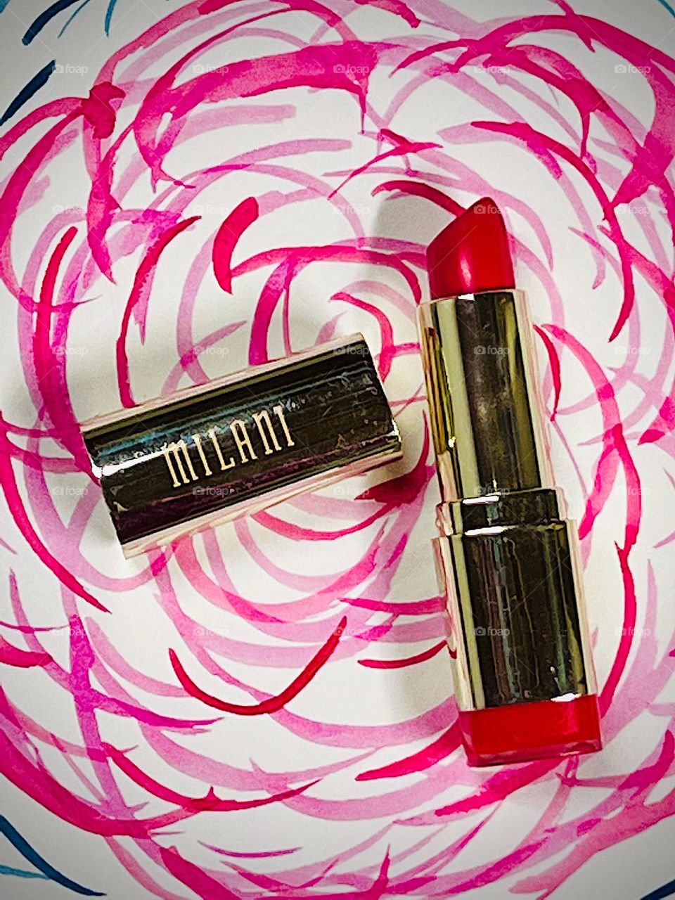 A bright, beautiful Milani lipstick, adds a stunning pop of color