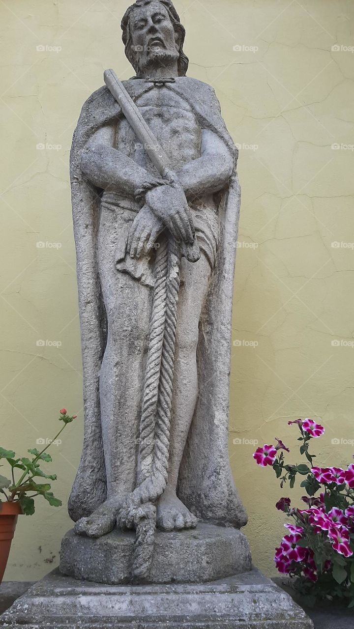 statue of St. Vincent and the Cathedral of Peter and Paul in Kamyanets-Podilskyi Ukraine