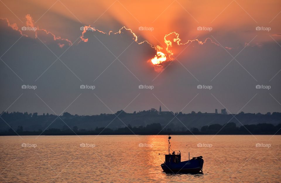 boat in the baltic sea in rewa on sunset time