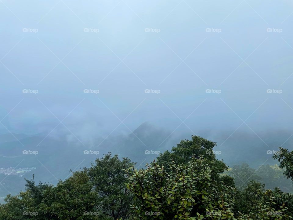 surrounded by clouds