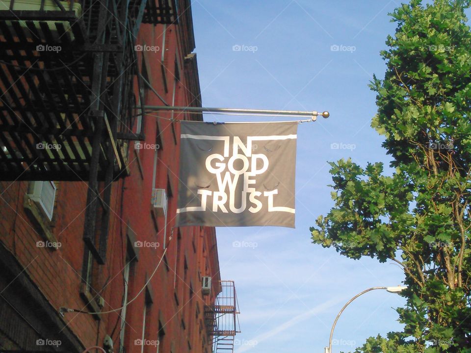 Believe In GOD Photo. I was walking to my job, when i spotted this flag