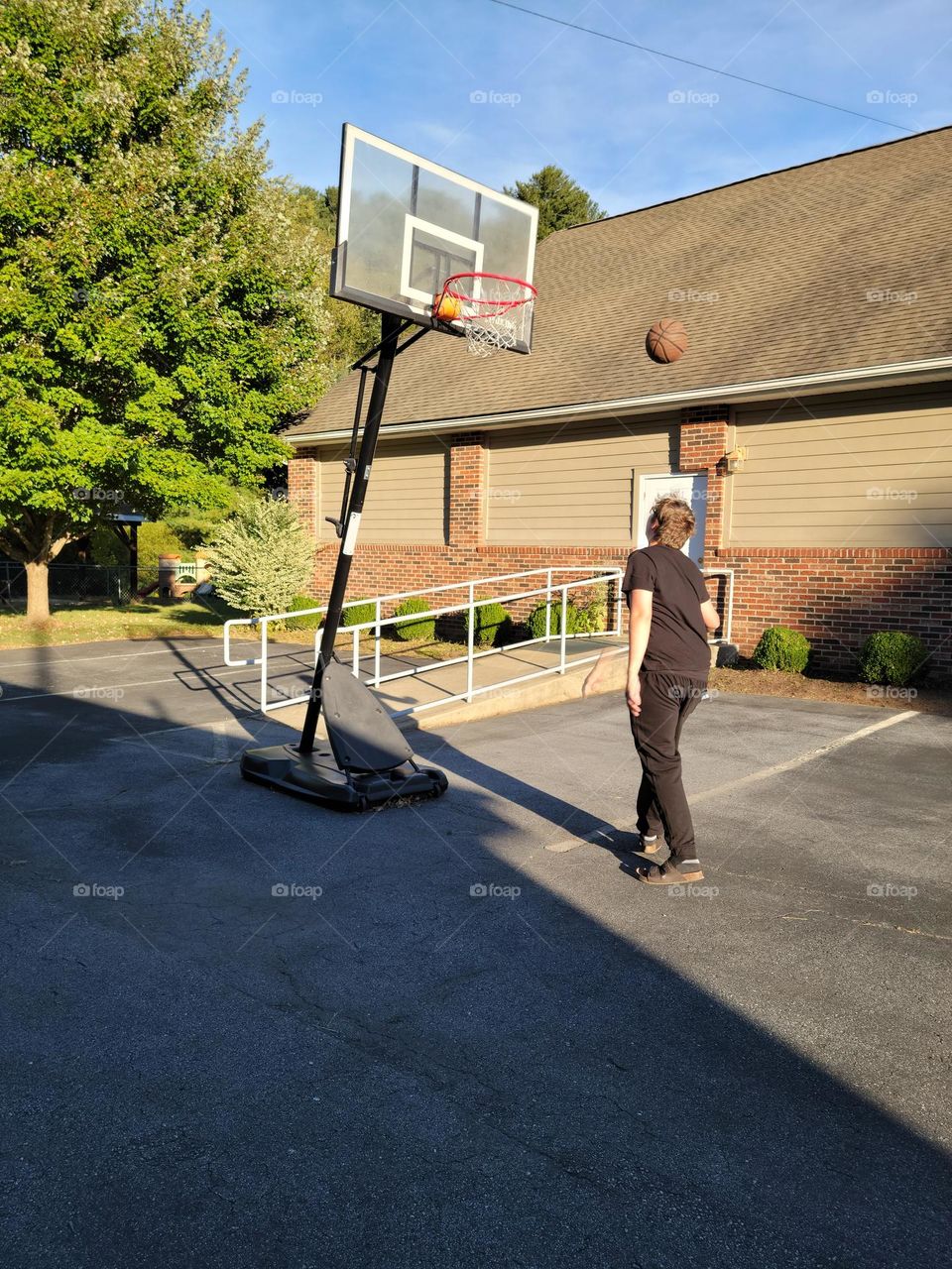 Grandson shooting hoops