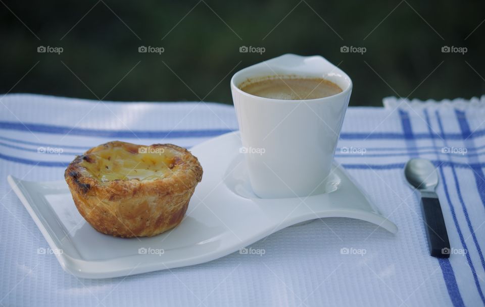 Daily breakfast of pastry with espresso 