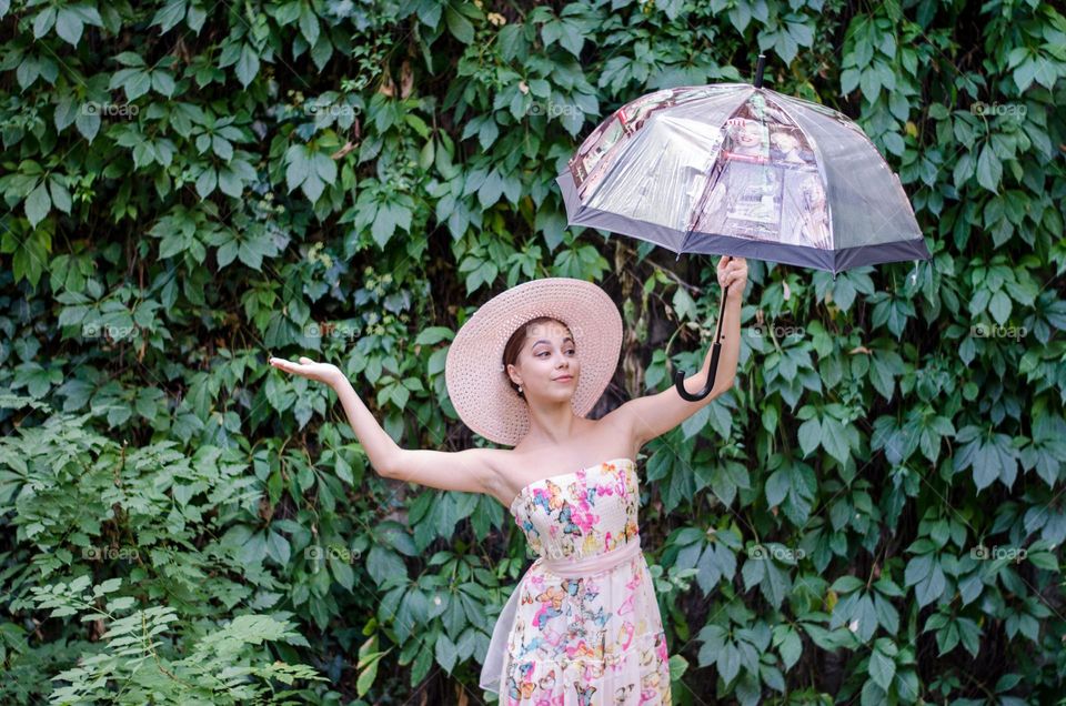 Pretty Young Girl Posing with Umbrella