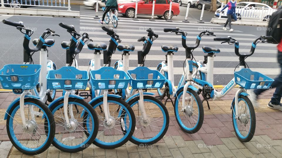 Blue bicycles on rent, China