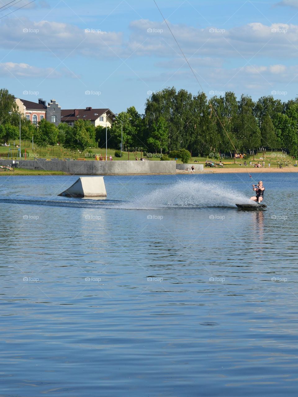 woman on a lake sport activities summer time