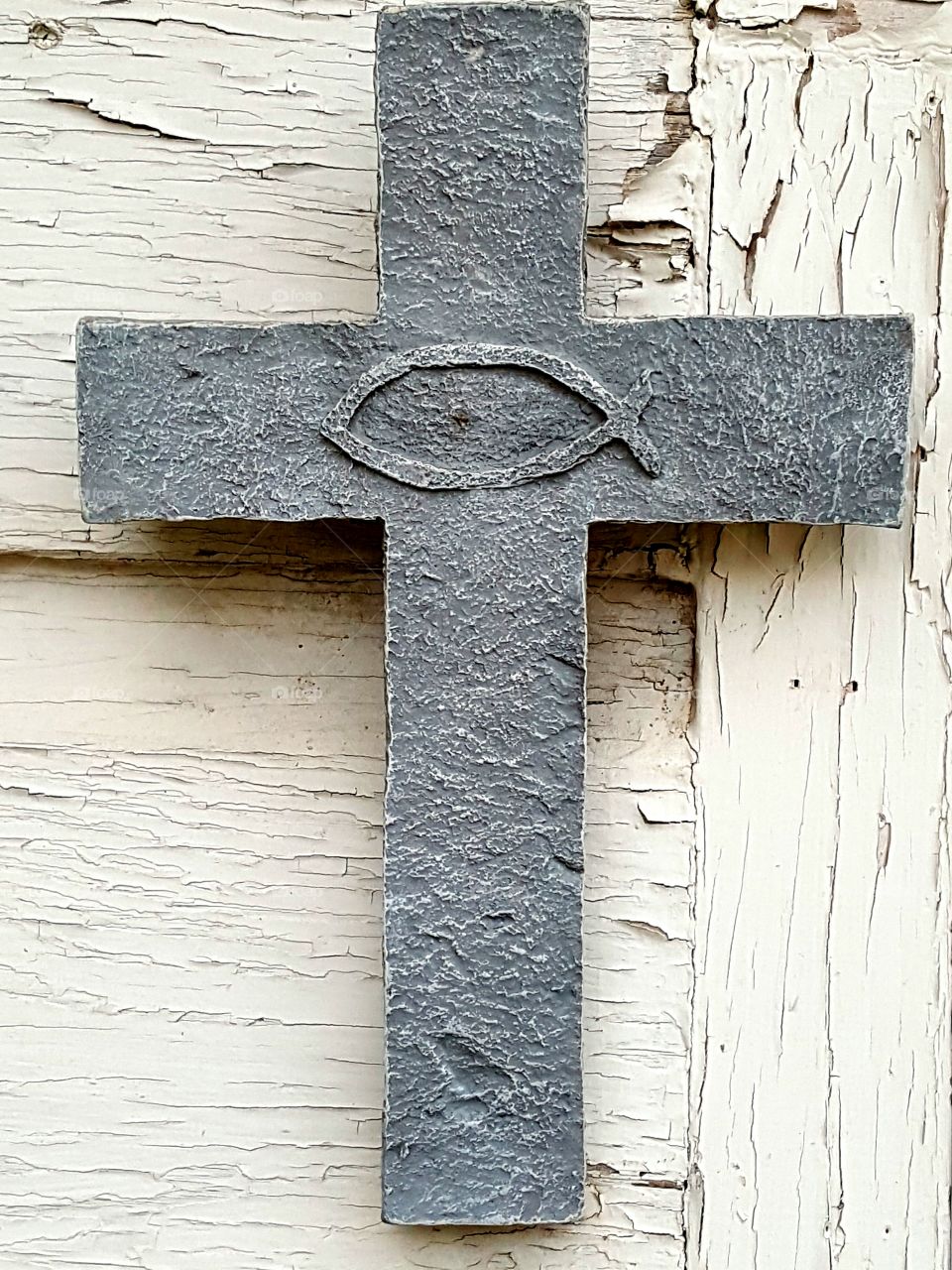 I can't remember exactly when we got this cross, but it's been hanging by our door for years.