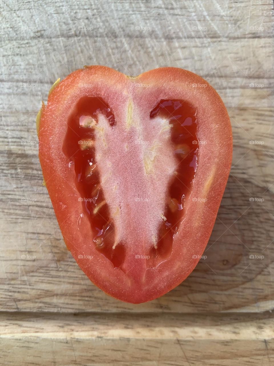 Heart shape tomato cut to half