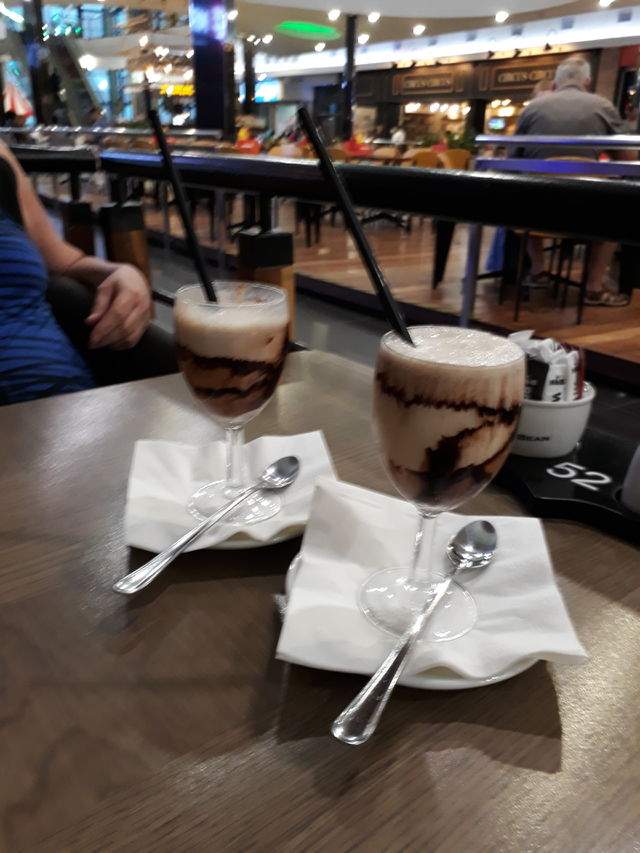 Enjoying a delicious Dom Pedro