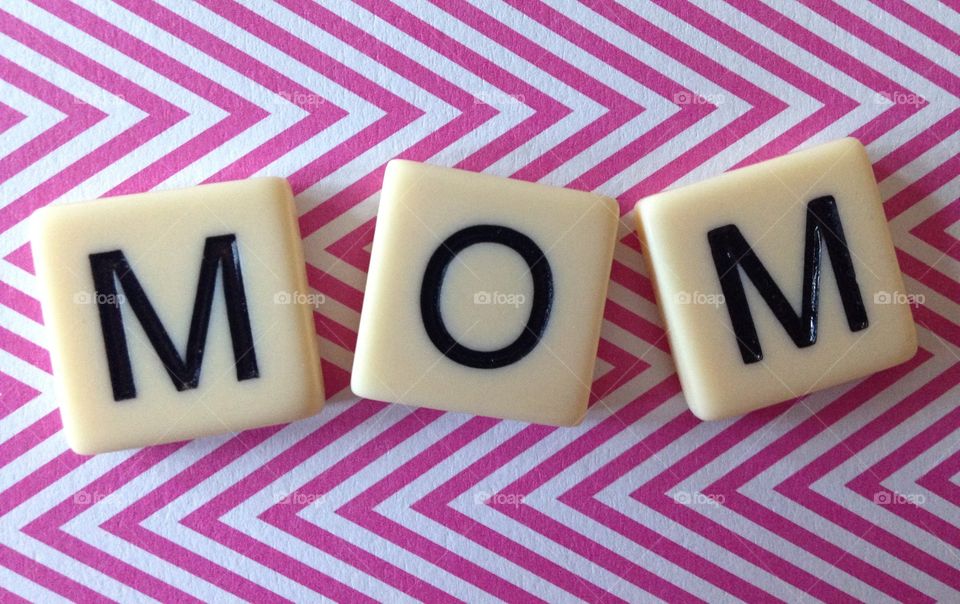 Mom. Mom made with letter tiles