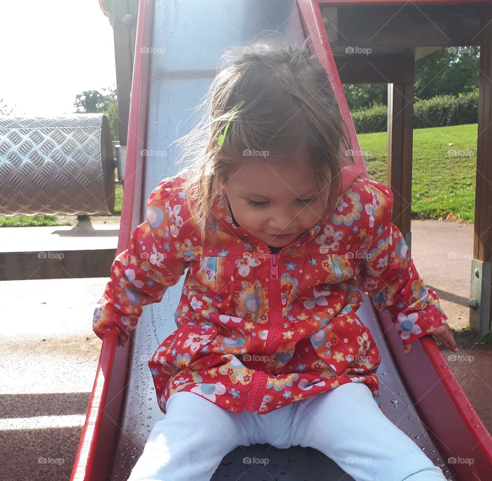 toddler on a slide