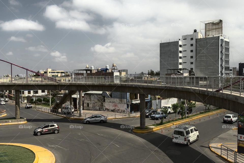 Pedestrian walkway over road in the city