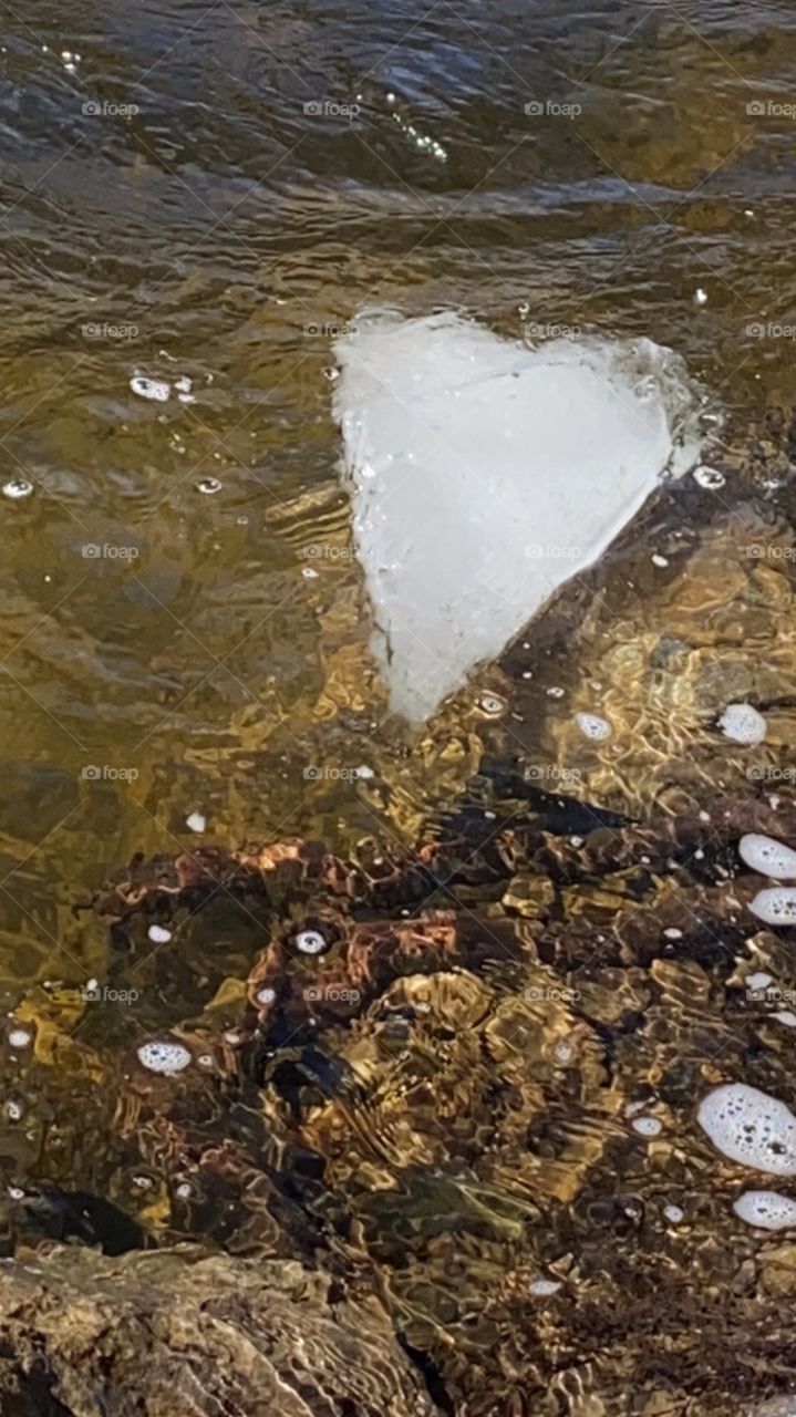 Nature ice heart found in the river 