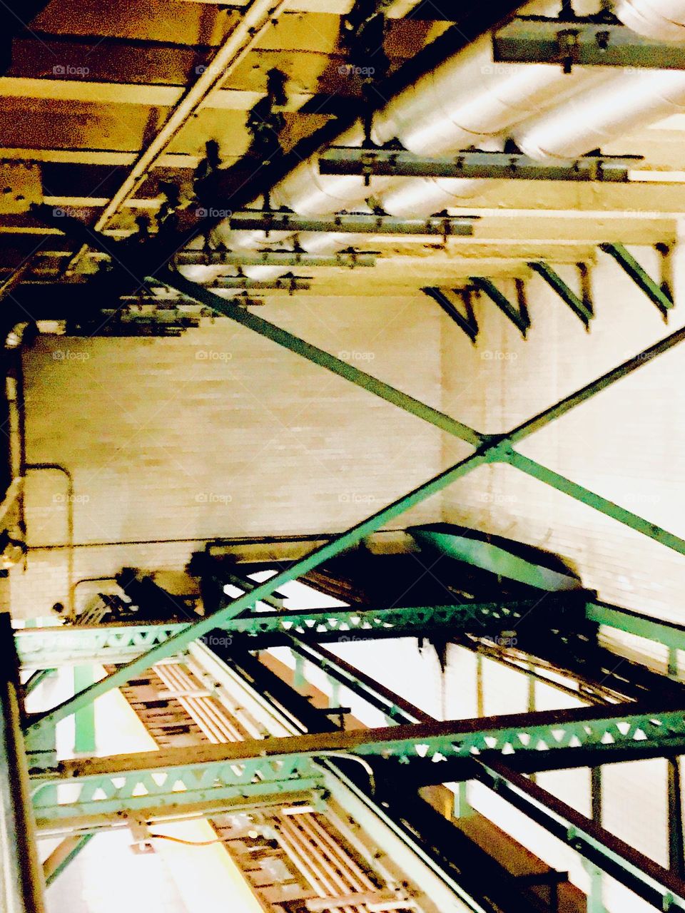 These are details of the ceiling of the “Vernon Jackson” 7 train subway station complete with nuts and bolts and piping. 2020. Hypnotic Productions