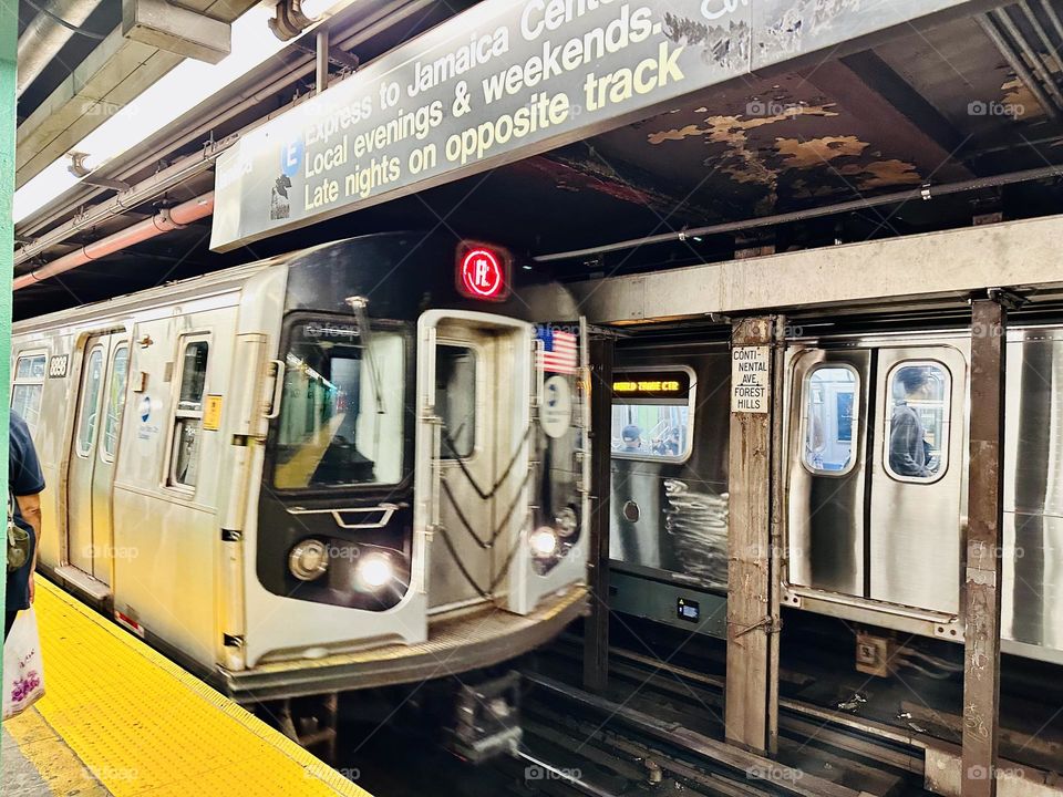 The New York City Subway is a rapid transit system moving commuters between the boroughs of Manhattan, Brooklyn, Queens, and the Bronx.