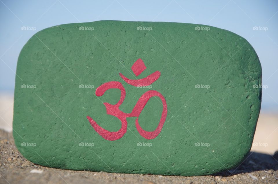 Om symbol on a stone