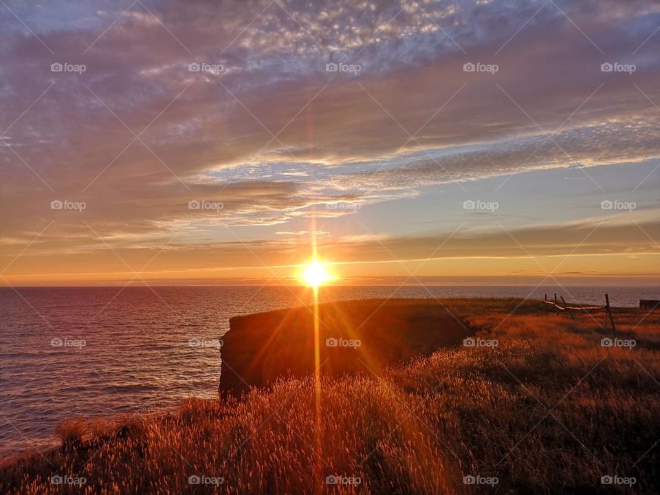 Beautiful sunset from the cliffs between Cap de Fatima and Belle-Anse. îles-de-Madeleine, Québec, Canada