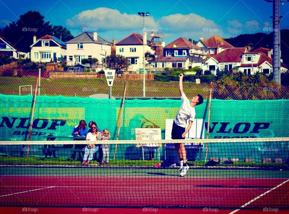 I came runner up in the DLTC tennis tournament 2015. This photo was taken during my last game.