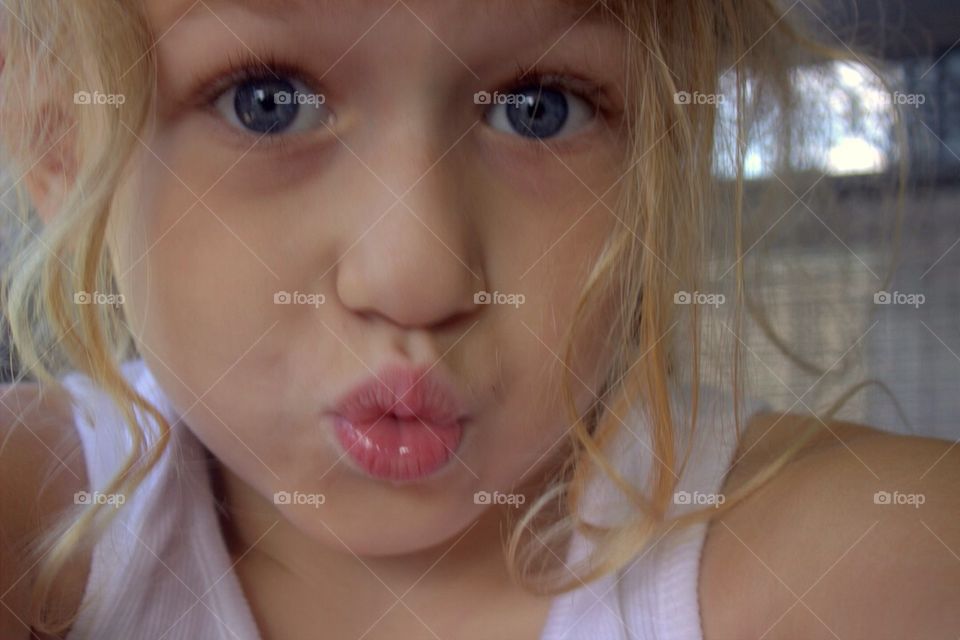 Cute little girl pouting