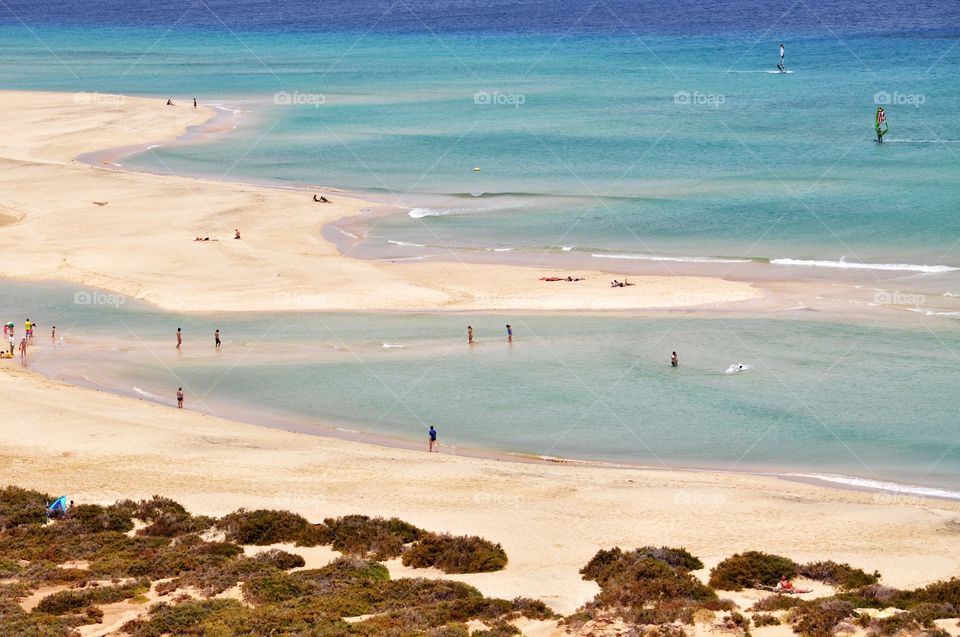 windsurfing on fuerteventura canary island in spain - paradise sotavento beach